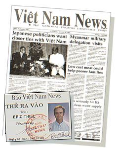 Working at newpaper in Vietnam as a journalist showing the newspaper and the author's ID.