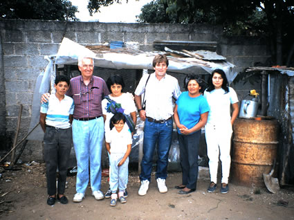 Peace Corps trainees with host family in Guatemala.