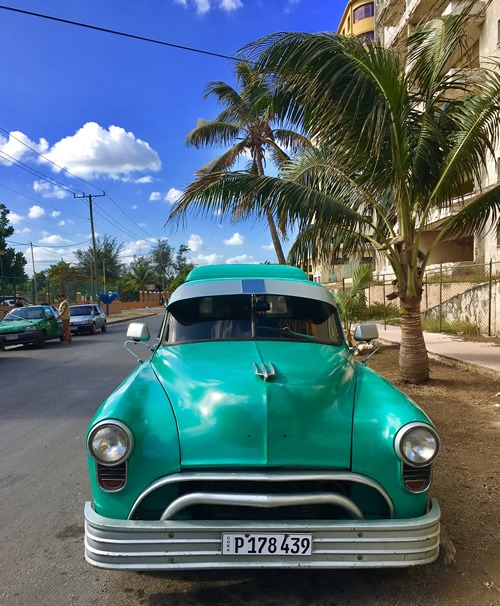 An old American refurbished car in Havana.
