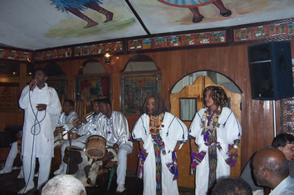 Ethiopian singer and dancers at a dinner club.