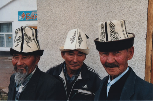Men in traditional hats and attire encountered in travels through Kyrgyzstan.