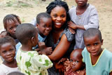 Akinmade with Children in Nigeria