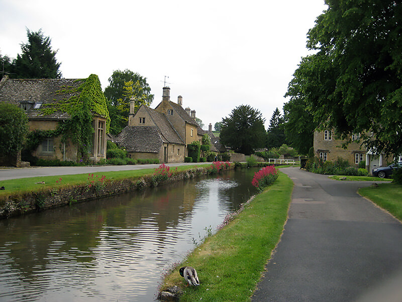The village with a river running through Cotswold in Oxfordshire near Oxford University.