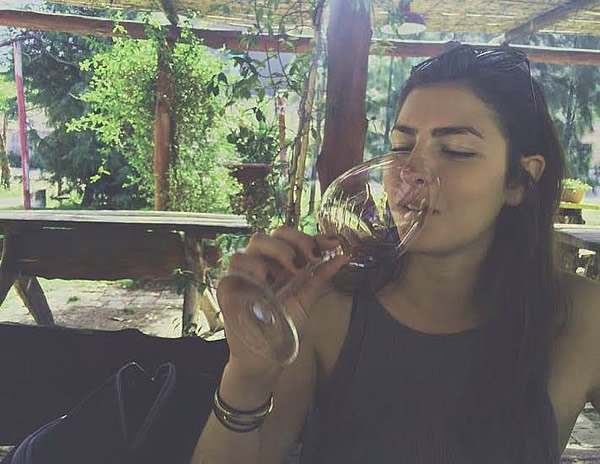 Author enjoying a glass of Argentinian red wine.