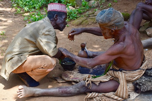 Dupa chief alias medicine man in healing session