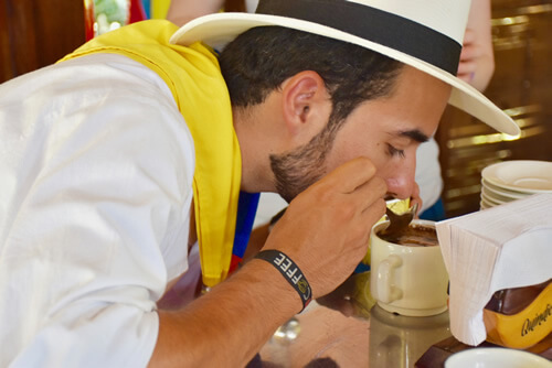 Cupper smelling coffee