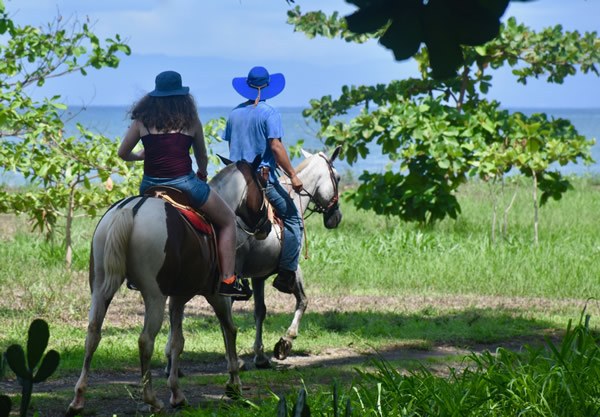 Horseback riding along the beach