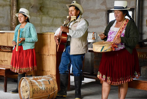 Cañari play on their hand-made music instruments