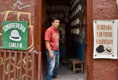 Don Camilo in front of his workshop