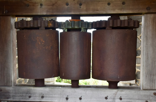 Old sugar cane press at Trois Rivières Distillery