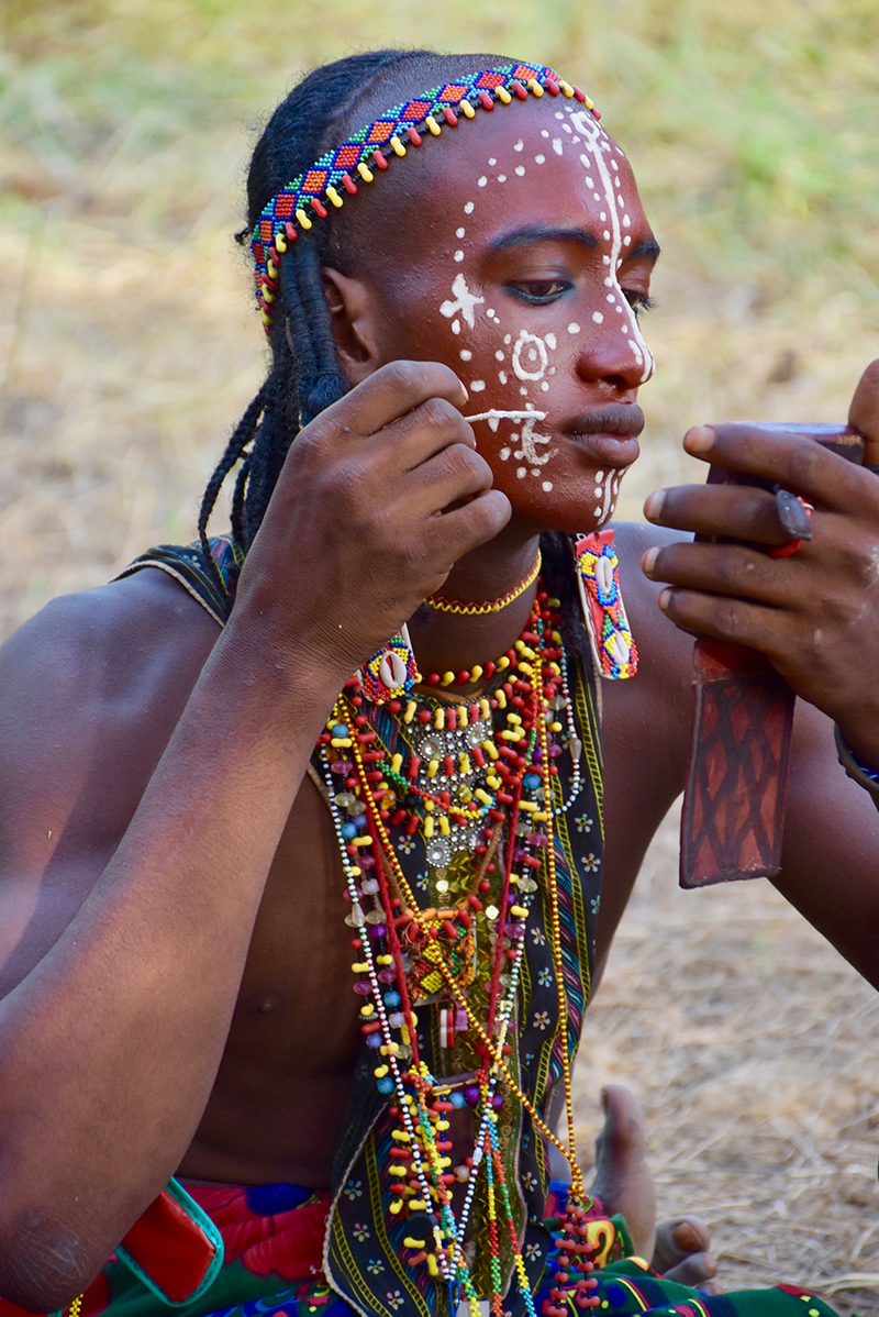 Wodabe man painting face  in Chad