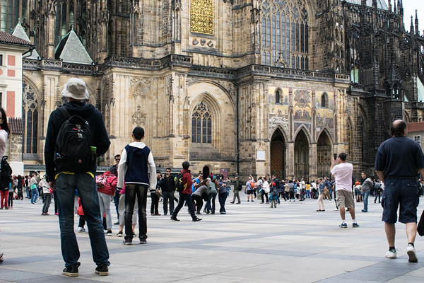 Tourists congregating around the Cathedral in Prague.