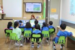 Classroom with students and teacher in South Korea.