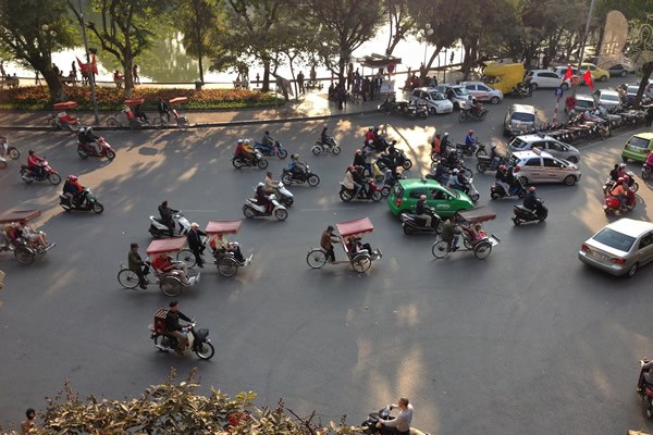 Typical traffic in lively Hanoi, Vietnam.