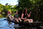 Rowing boat on Amazon river. Teach English in Arequipa, Peru.