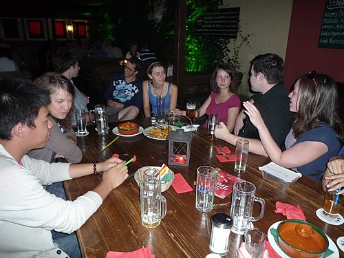 The author enjoys a typical evening with friends in a restaurant.