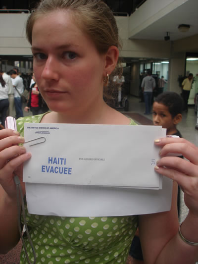 Evacuee with evacuation papers from Haiti