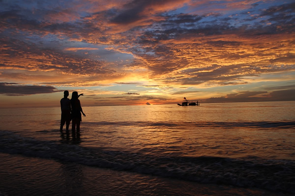 Long-term slow travel: Watching a sunrise on seashore in Vietnam.
