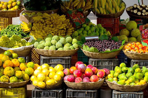 A display of produce at a fruit market.