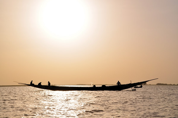 Fishermen on a boat in Niger