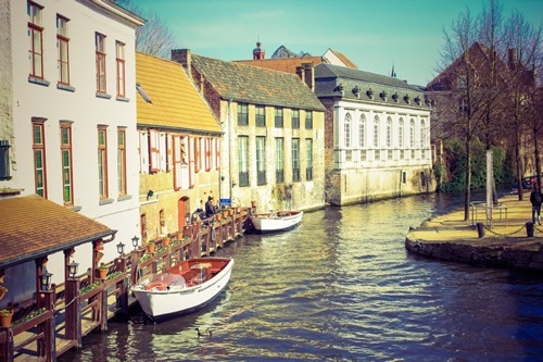 Peaceful river scene in a European town
