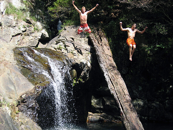 Diving from a waterfall in Queensland, Australia