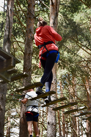 Woman preparing to zip line.