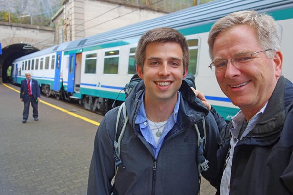 Andy and Rick Steves at train station.