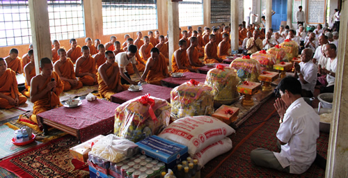 Cambodian Buddhist monks chanting during a ceremony.