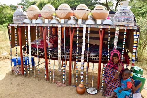 House of the Wodaabe in Chad with mother and child.