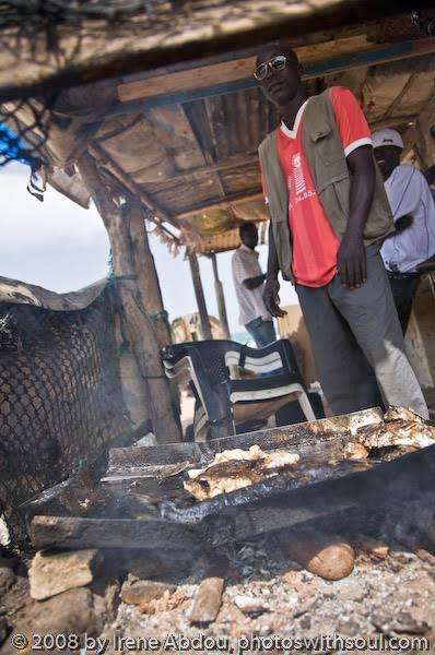 Men with fish at Yoff, Dakar.