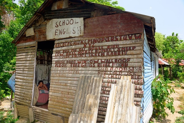 Estefani learned English on her home's back wall in the Dominican Republic.