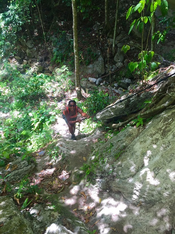 Braving the last climb to reach the waterfalls.