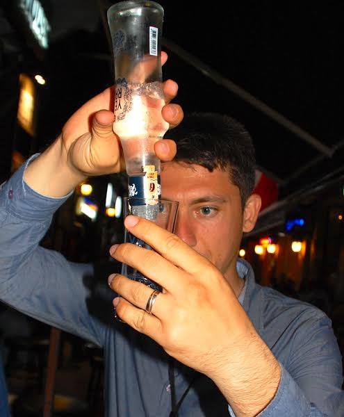 Tour guide Korhan dilutes raki