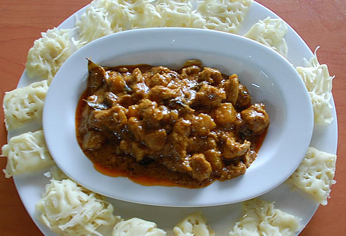 Kari Ayam with Roti Jala in Kuala Lumpur.