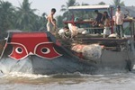 Enjoying life on a boat on the Mekong river.