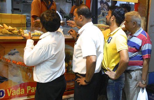 Chef and guide Leroy at vada pav stall