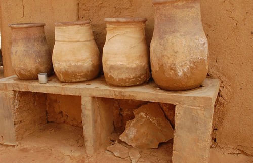 Many small settlements have big water vessels in front of their place for any passerby.