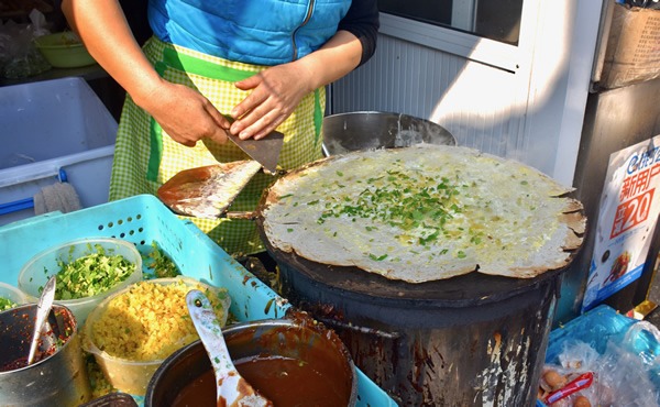 A Chinese-style crepe, jianbing, for breakfast or snack in Shanghai.