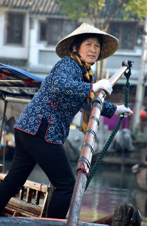 Gondola in the canals of Zhouzhuang water town.