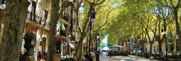 A panorama of a quiet street scene in Palma de Mallorca, Spain.