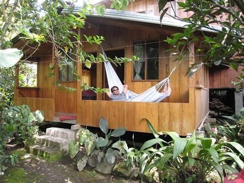 Solo travel in Ecuador in a hotel, laying in hammock.