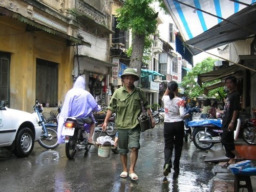 Street encounter saying hello to an approaching local in Vietnam.