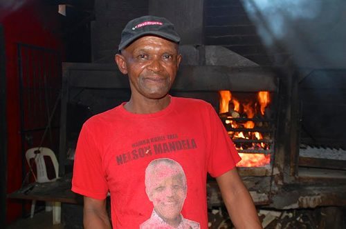 "Braai" (BBQ) is prepared at Mzoli's.