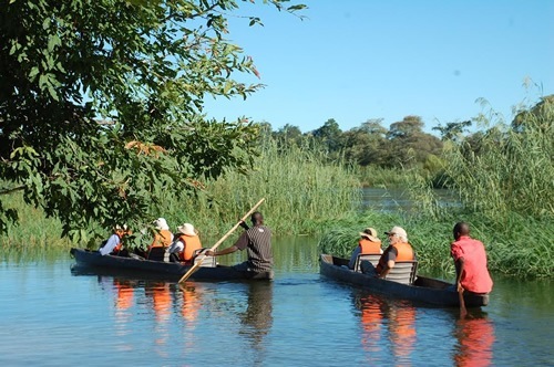 Okavango River in traditional "mokoro."