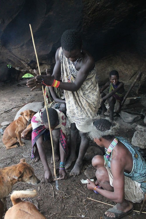 Hadzabe gathered around the fire.