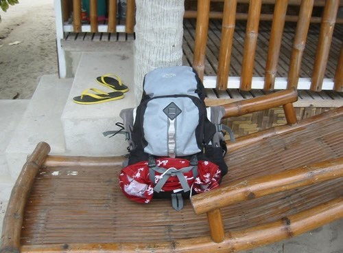 Backpack on the chair. Pack light, travel light.