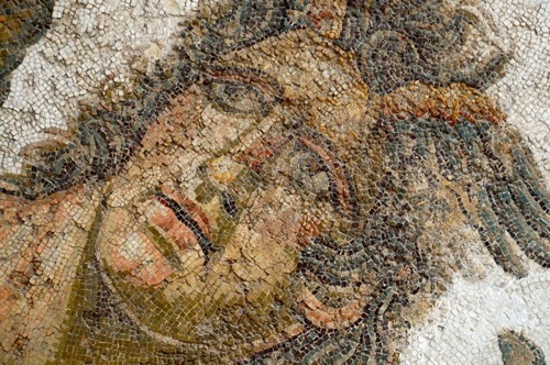 A mosaic on the wall of a Roman villa.