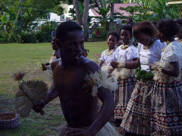 Fijians preparing for dance ceremony
