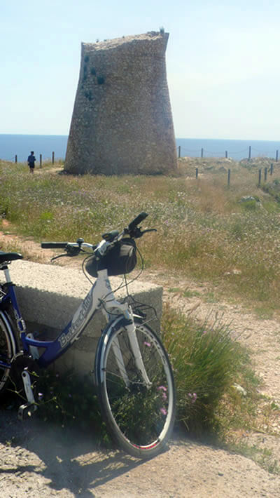 Visiting a coastal watchtower on the coast of Puglia.